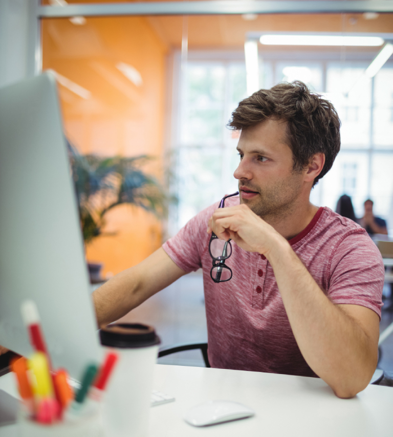  Man at desk, working on  PHP upgrade of a WordPress website at Ideal Webkit